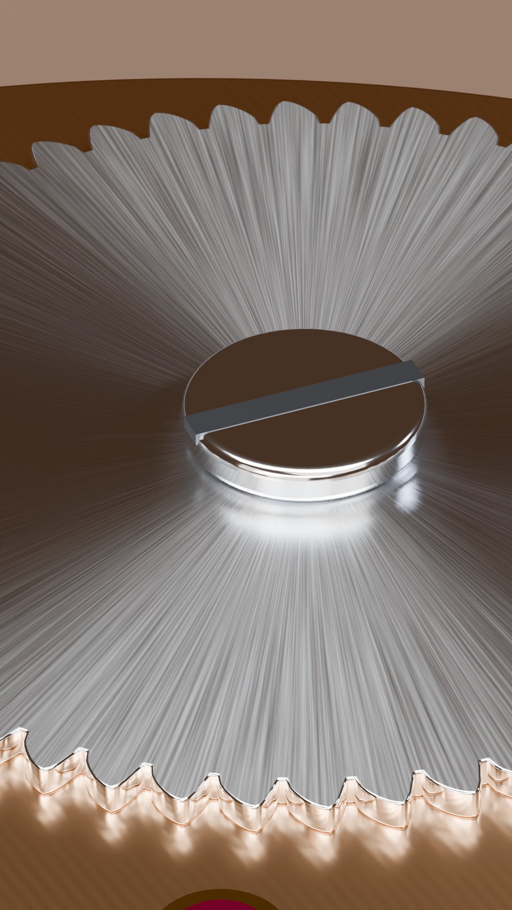 Close-up of a sunburst-finished steel ratchet wheel